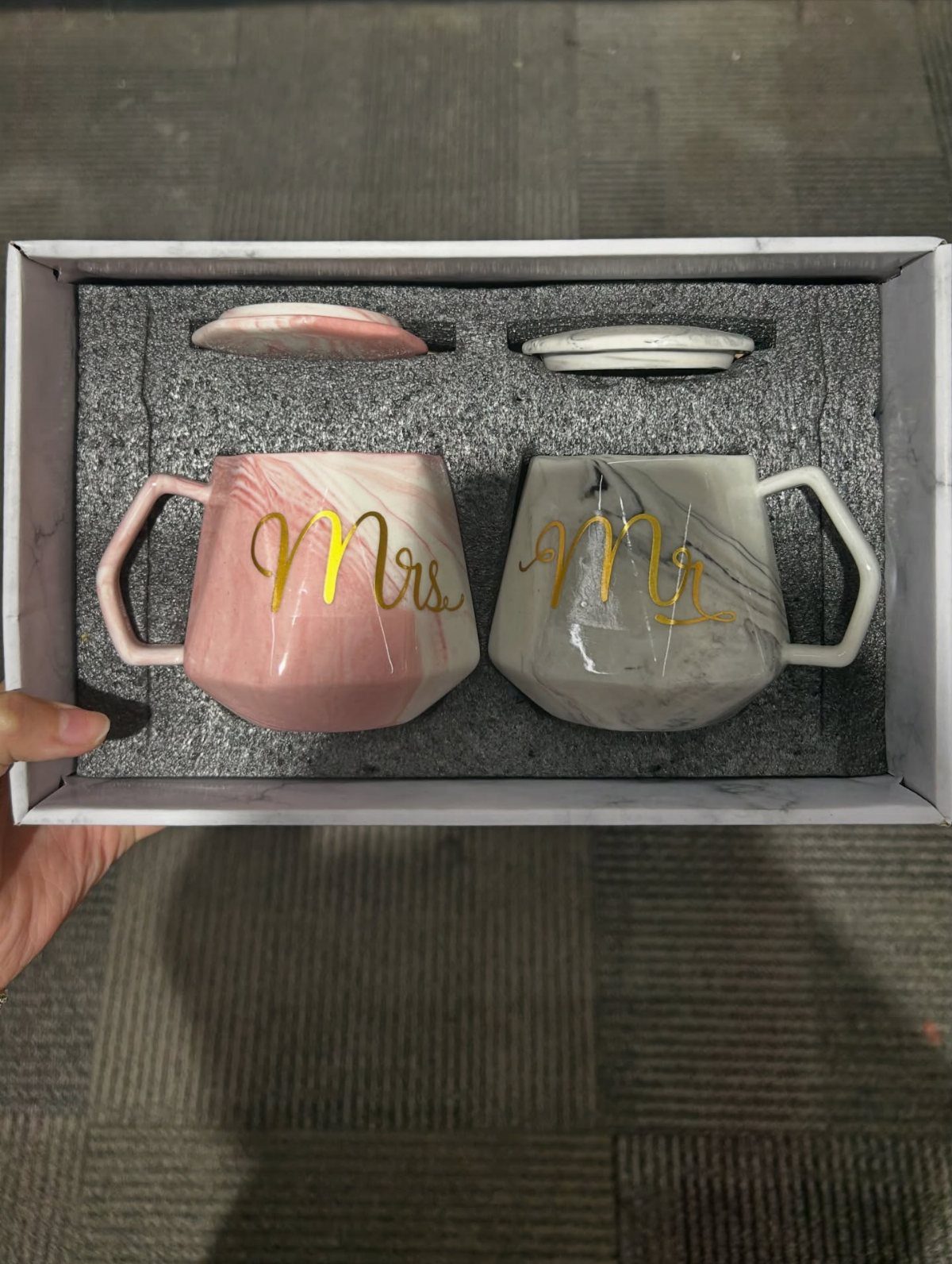 Two marble-patterned Mr. and Mrs. mugs in a white gift box.