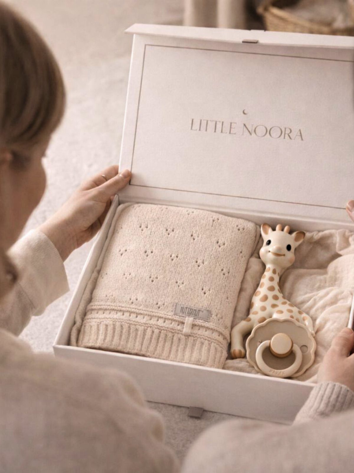 Luxury baby gift set with knitted blanket and giraffe toy in white box