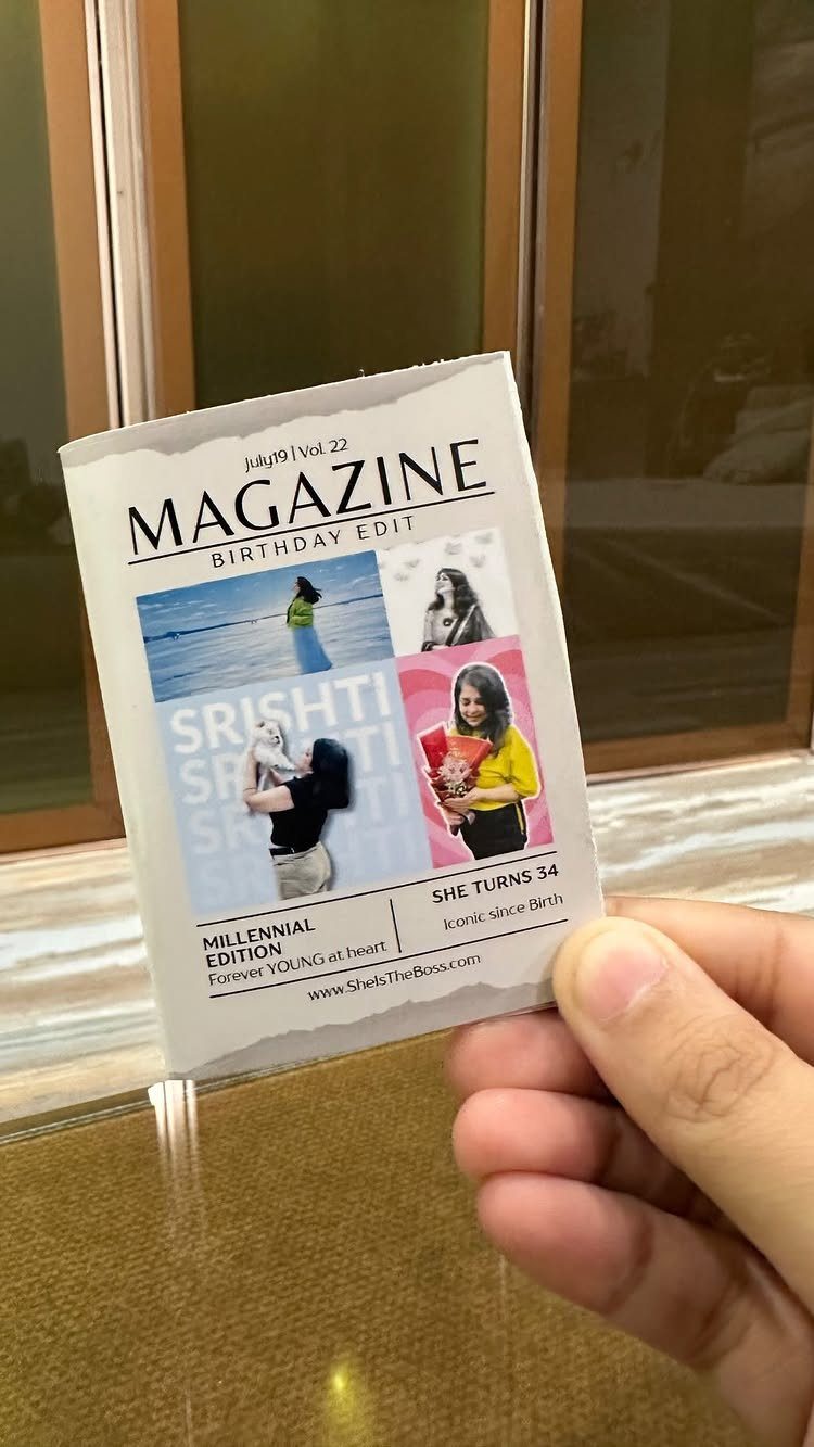 Custom birthday magazine held in a hand featuring photos and personalized text.