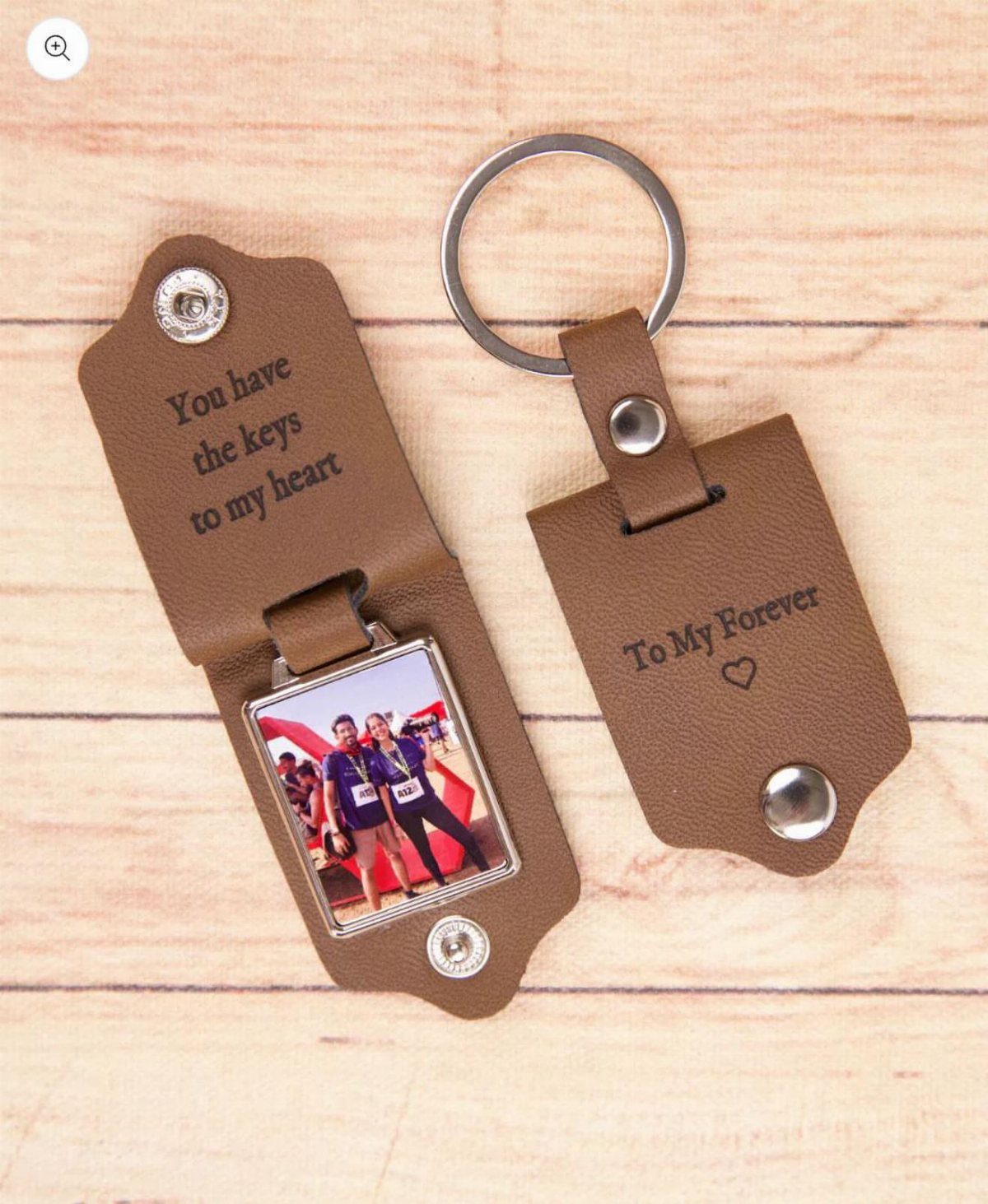 Brown leather keychains with a couple's photo and romantic engraved messages.