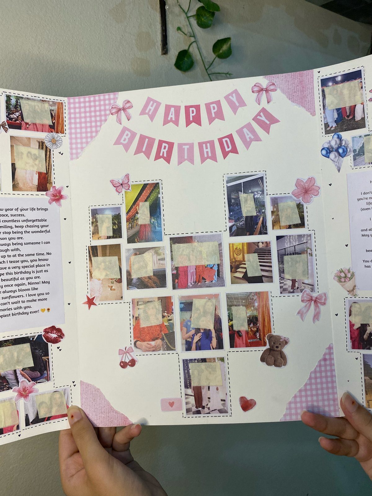 Handmade birthday scrapbook with photos, ribbons, and a Happy Birthday banner held open.