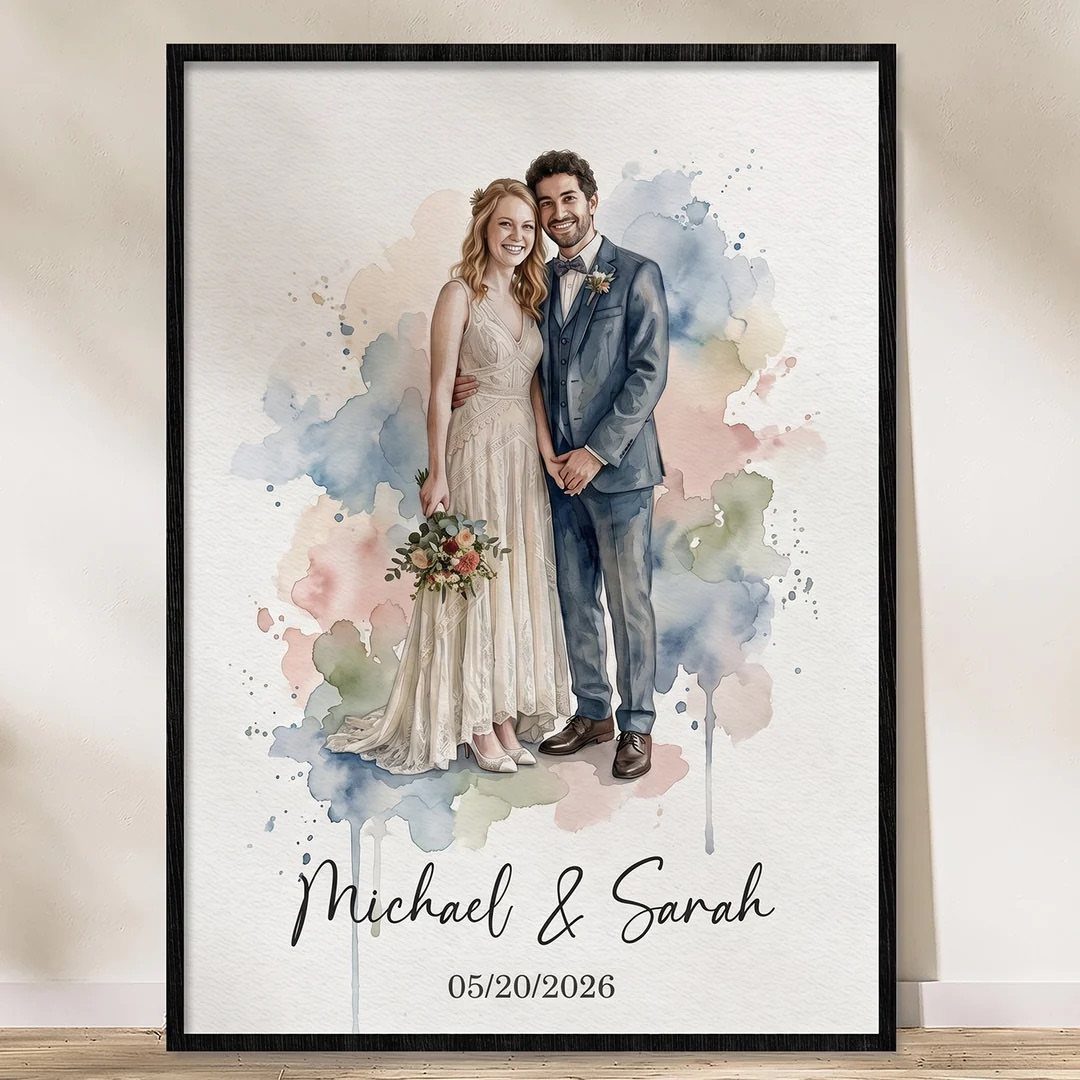 Framed watercolor art print of a wedding couple with names and date below.