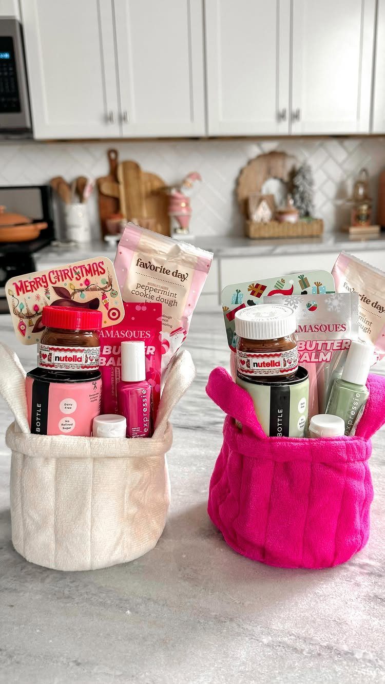 Two plush gift baskets filled with Nutella and beauty products on a kitchen counter.