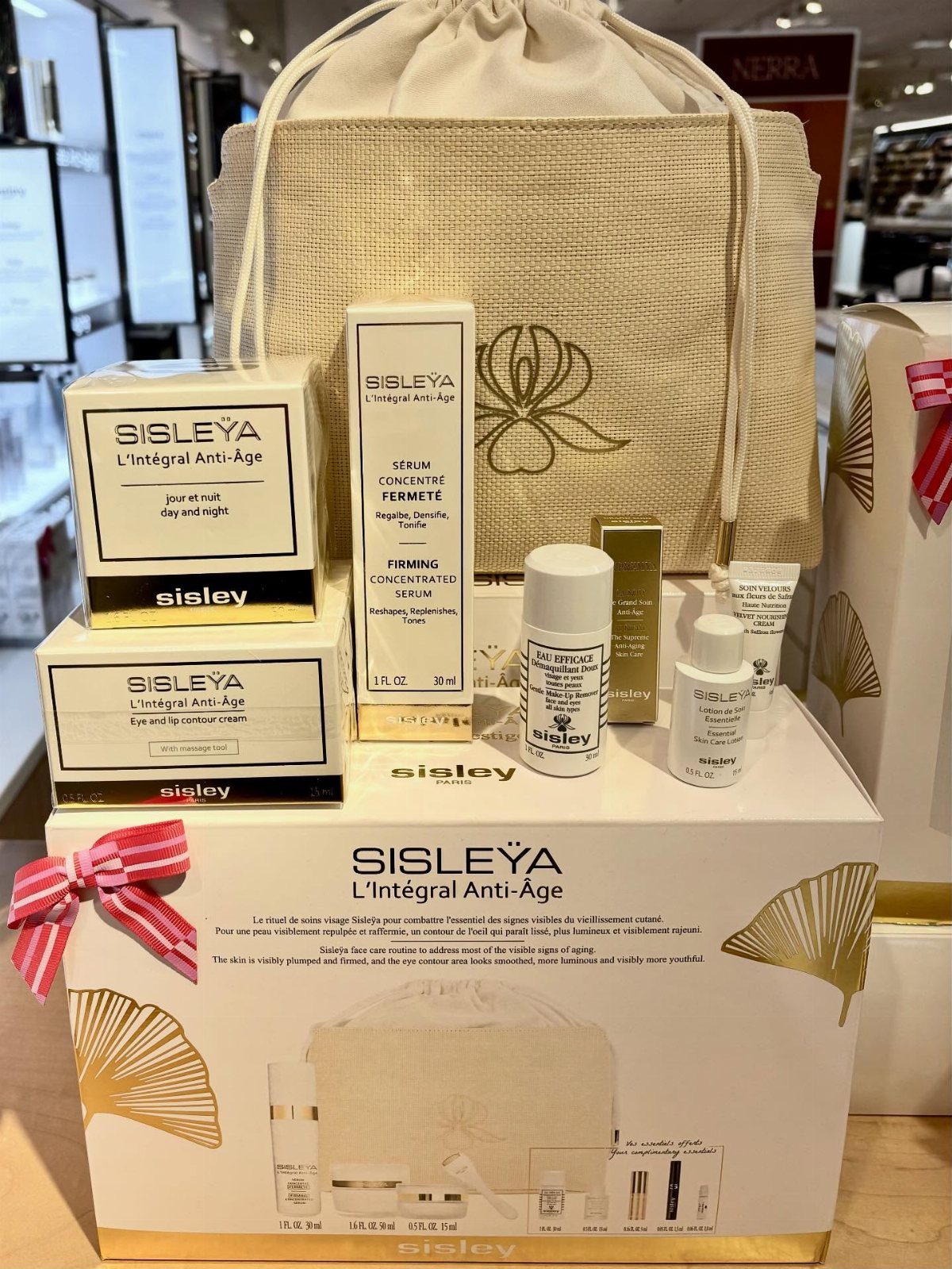 Sisley skincare set with anti-aging creams and bottles in a gift box.