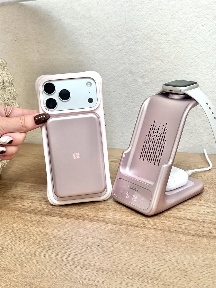 Rose gold iPhone and Apple Watch on a matching wireless charging station.