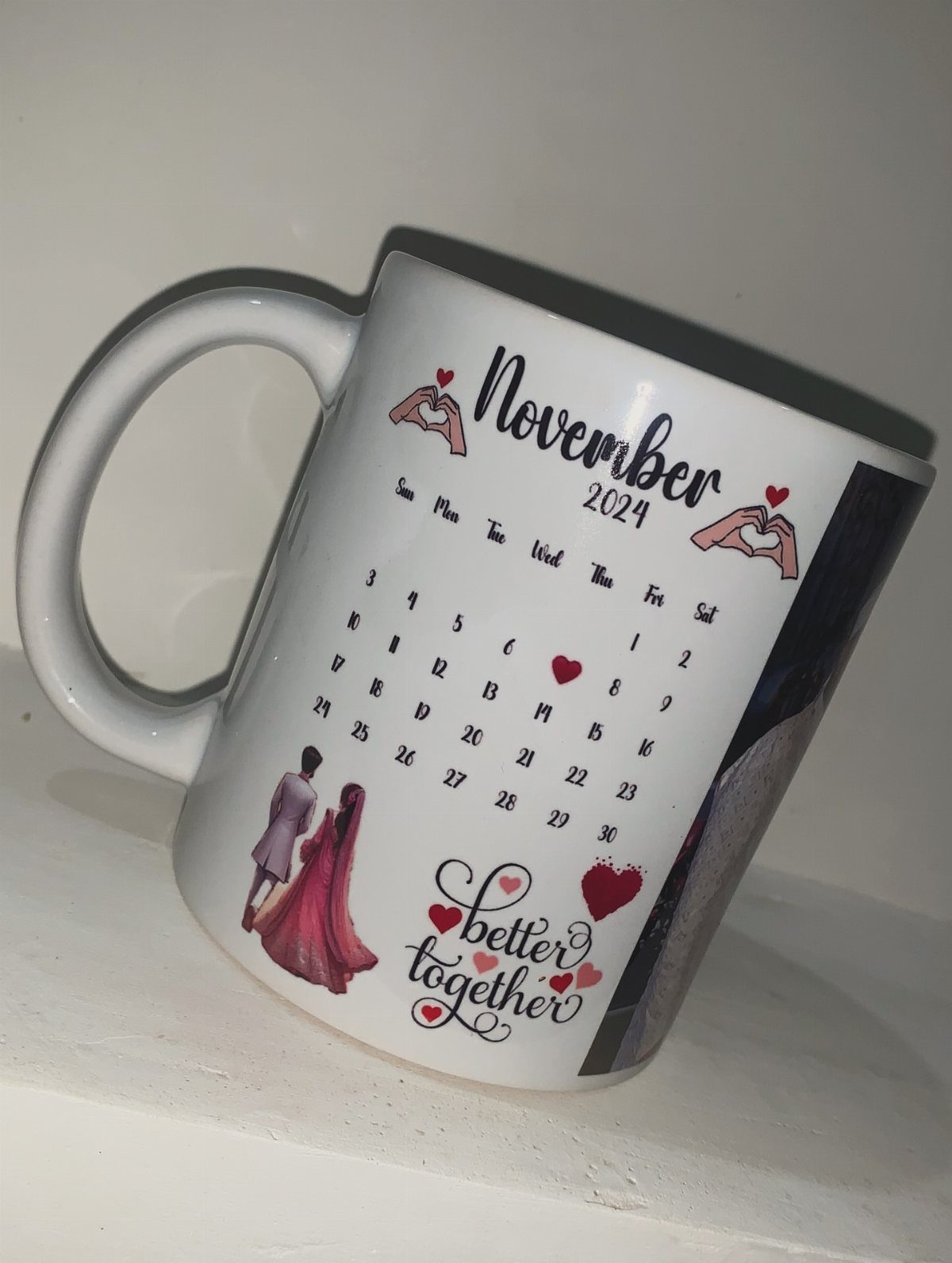 Personalized white ceramic mug with a November 2024 calendar and romantic illustrations.