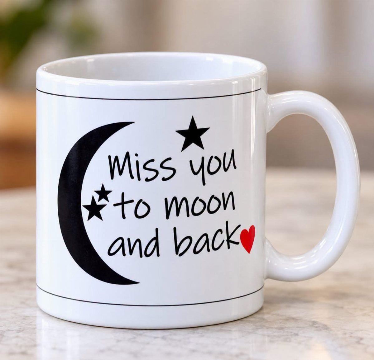 White ceramic mug with moon, stars, and Miss you to moon and back text.