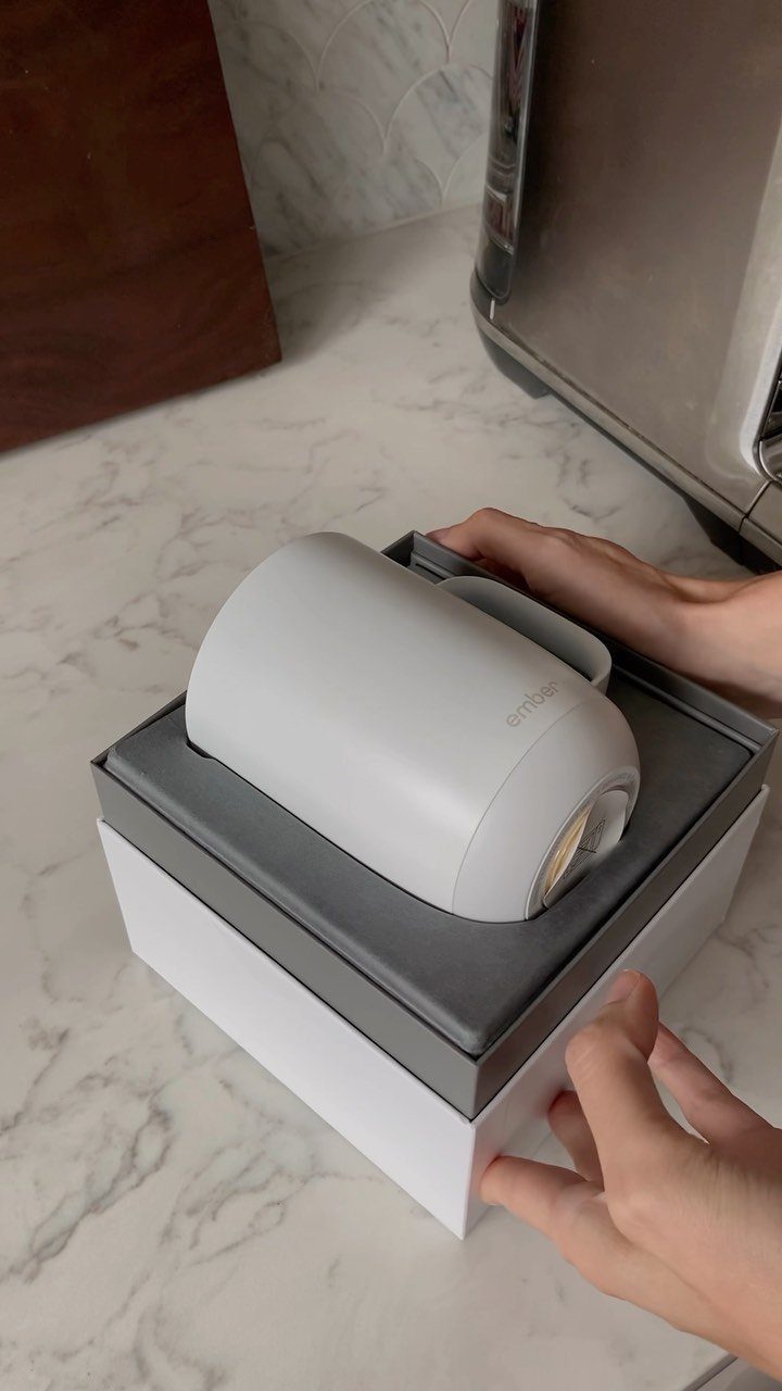 White Ember smart mug inside its original grey and white packaging box.