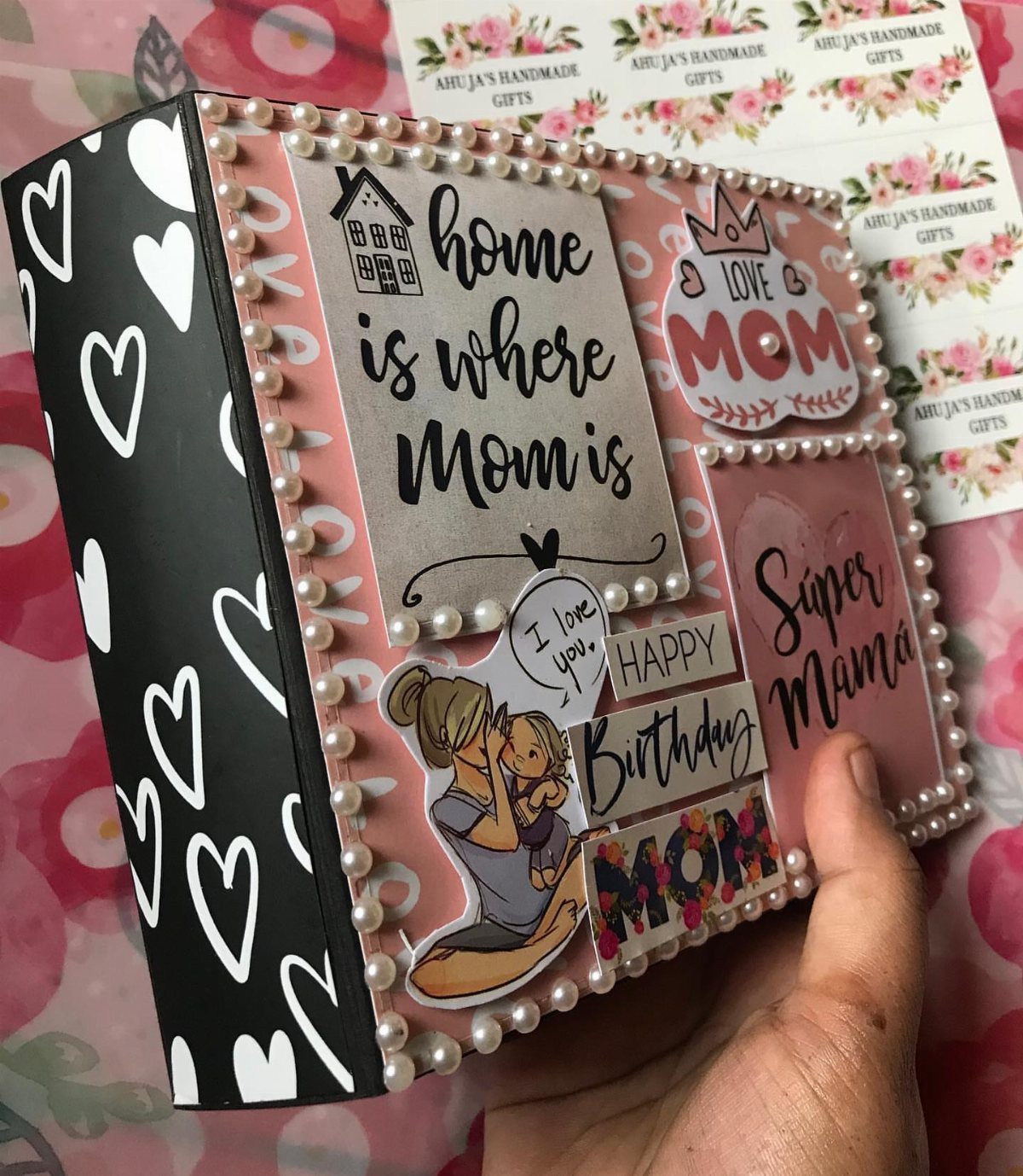 Decorated birthday gift box for mom with pearls, hearts, and sentimental messages.