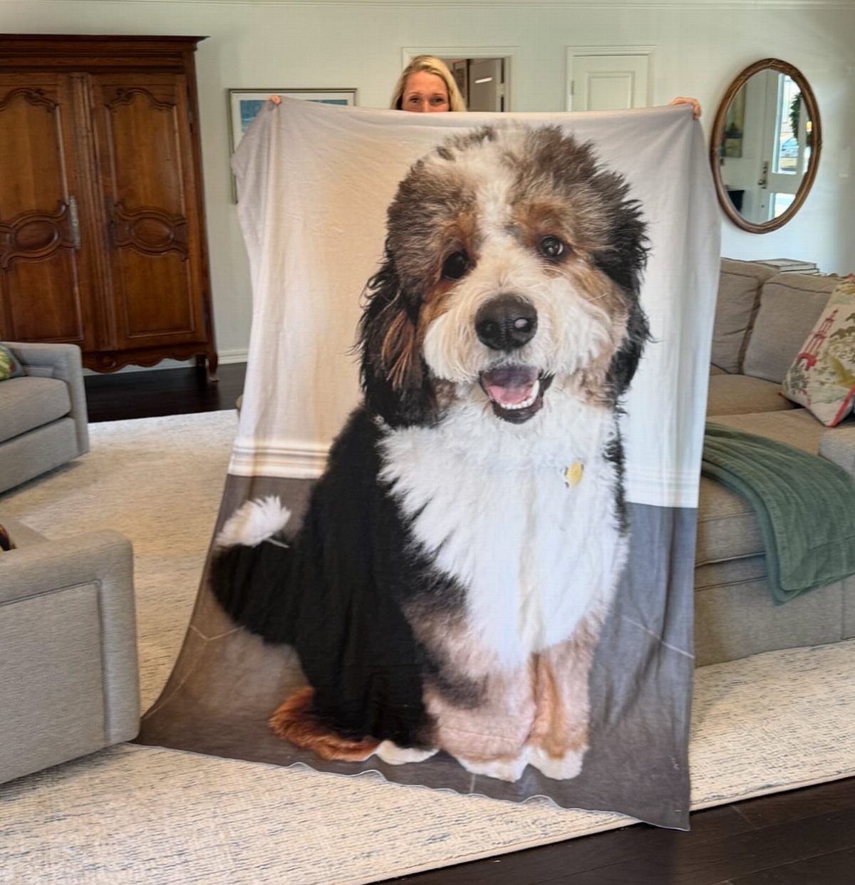 Personalized fleece blanket featuring a large photo of a fluffy tri-color Bernedoodle dog.