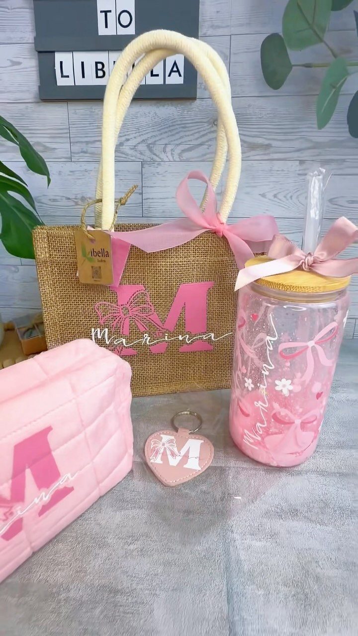 Personalized pink and tan gift set featuring a burlap tote, tumbler, and pouch.