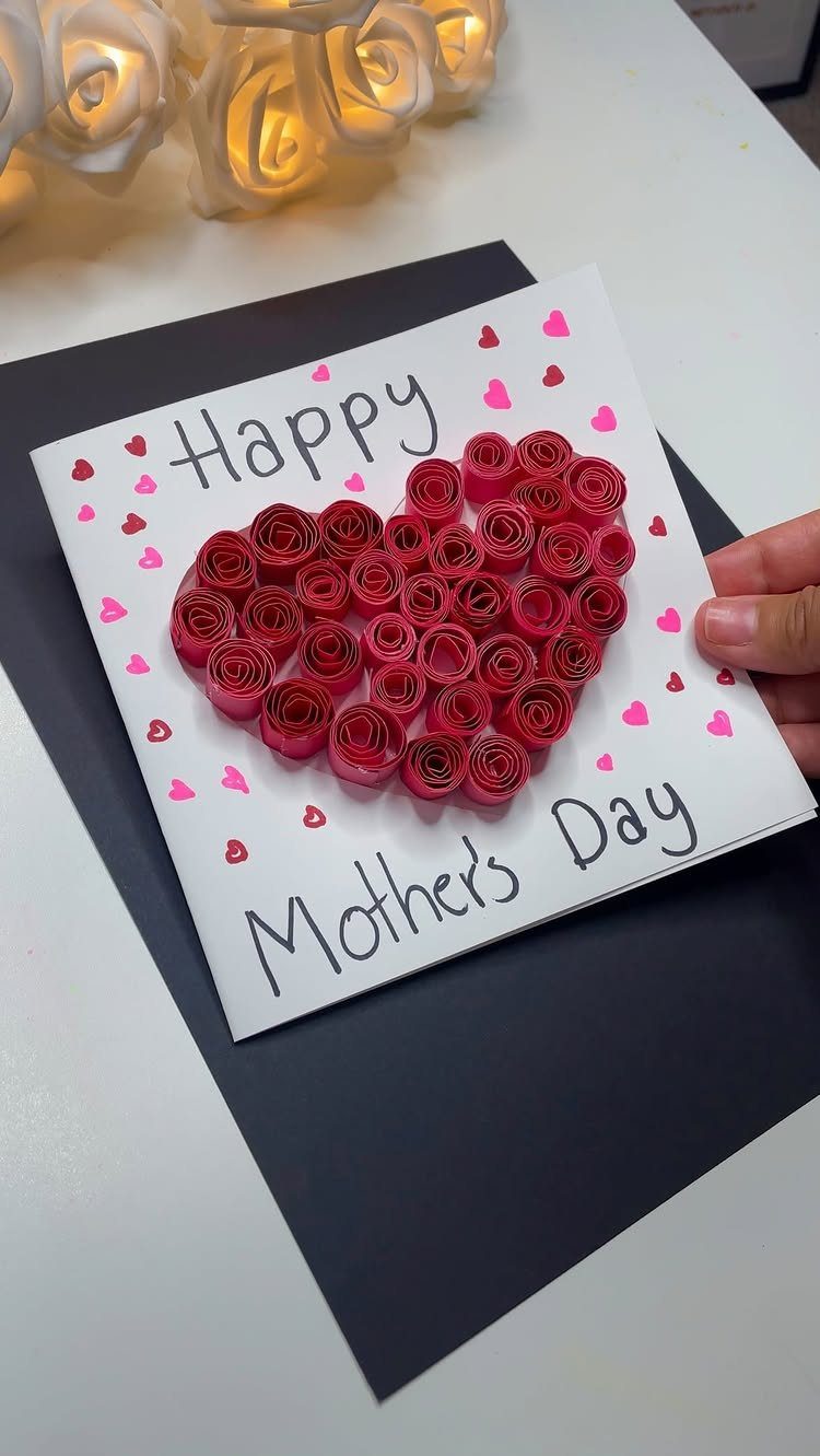 Handmade Mother's Day card with a heart made of red paper roses.