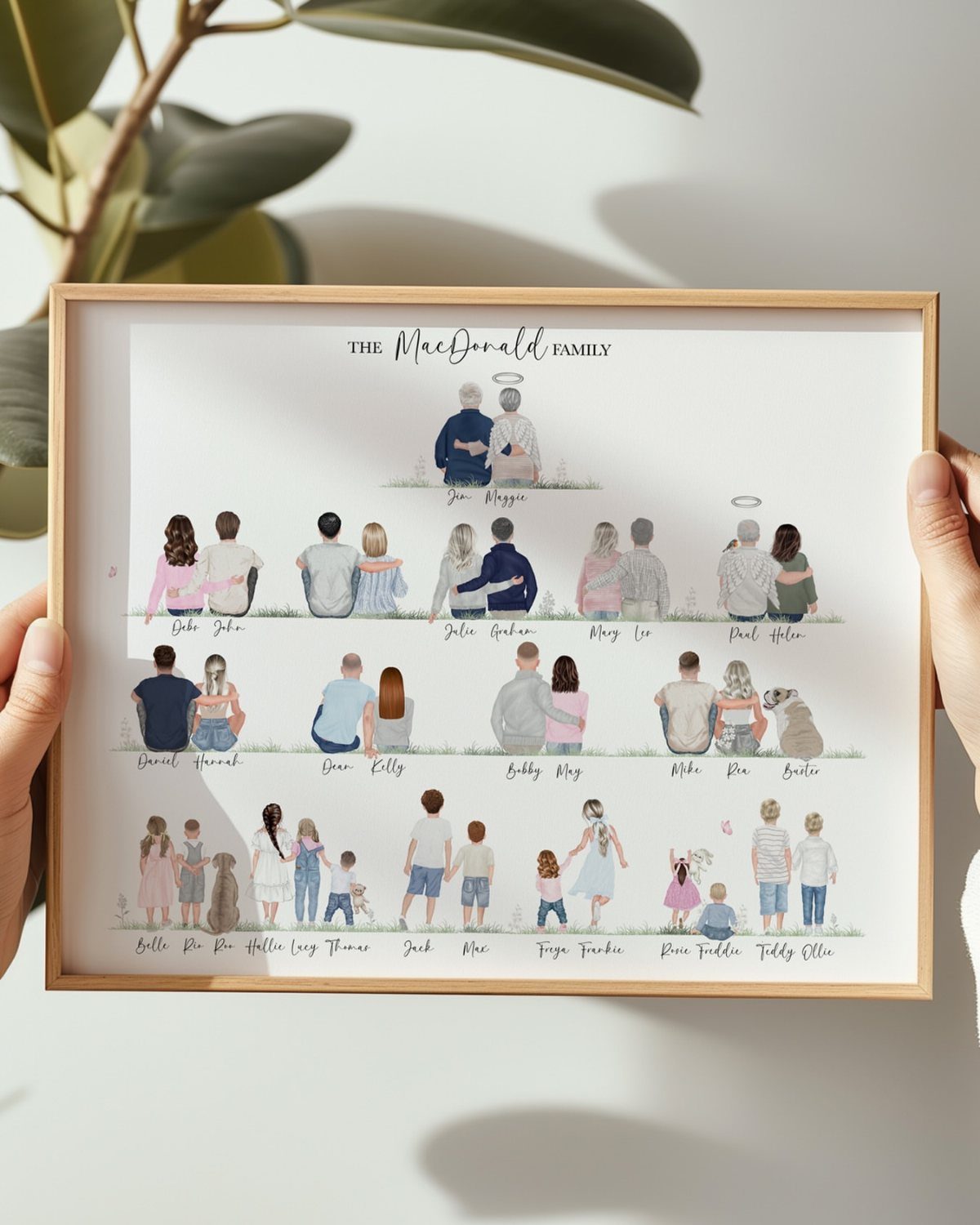 Custom family illustration in a wooden frame showing multiple generations of family members.