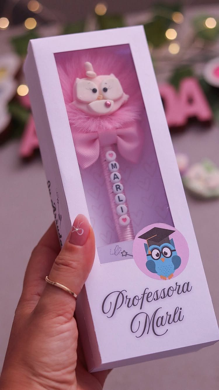Decorative pink owl pen in a personalized white gift box for a teacher.