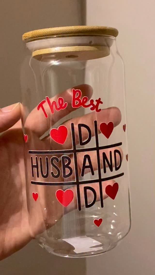 Clear glass jar with wooden lid featuring The Best Husband and Dad text.