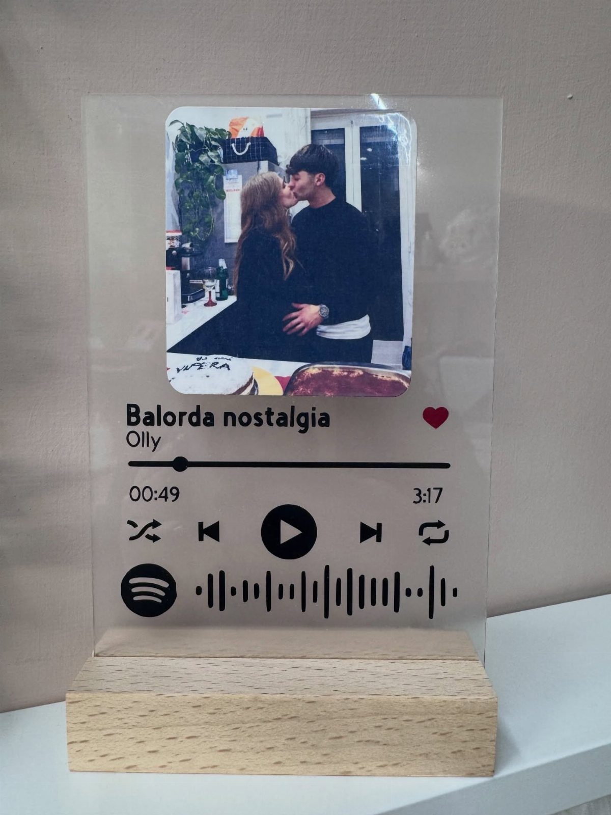 Personalized acrylic song plaque with a couple's photo and music playback interface.
