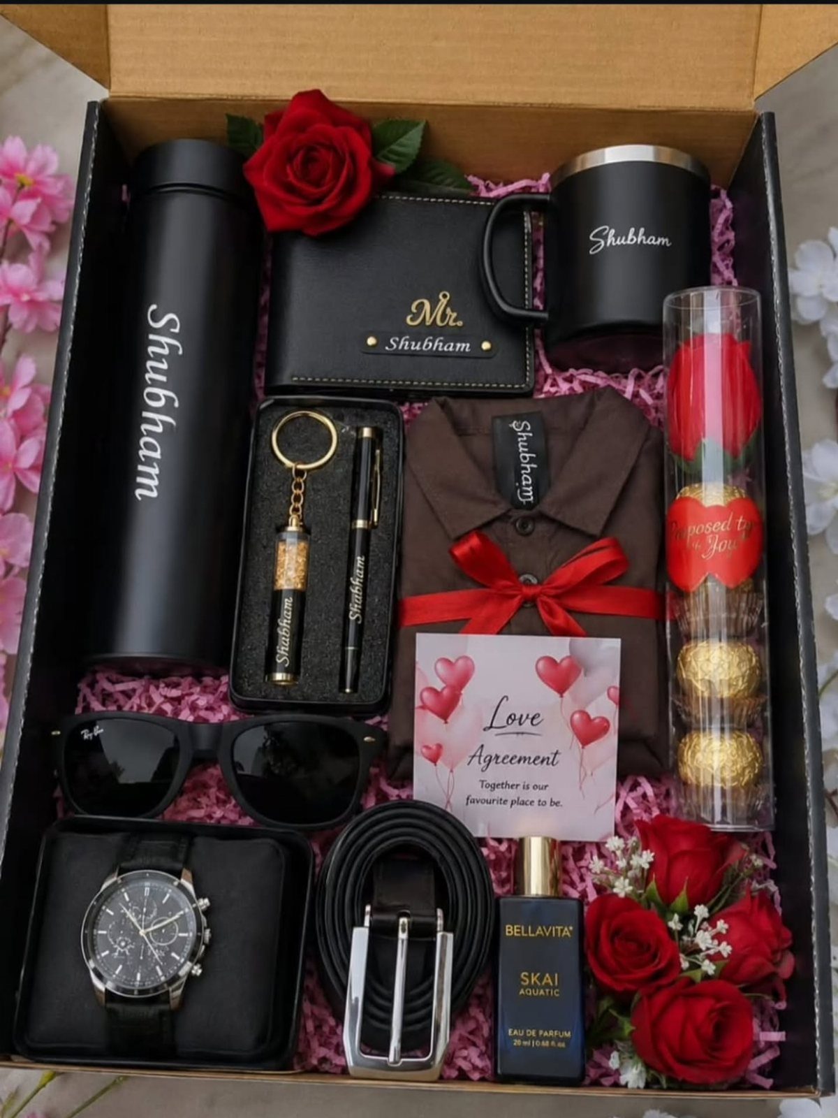 Personalized gift box for men with watch, wallet, belt, sunglasses, and red roses.