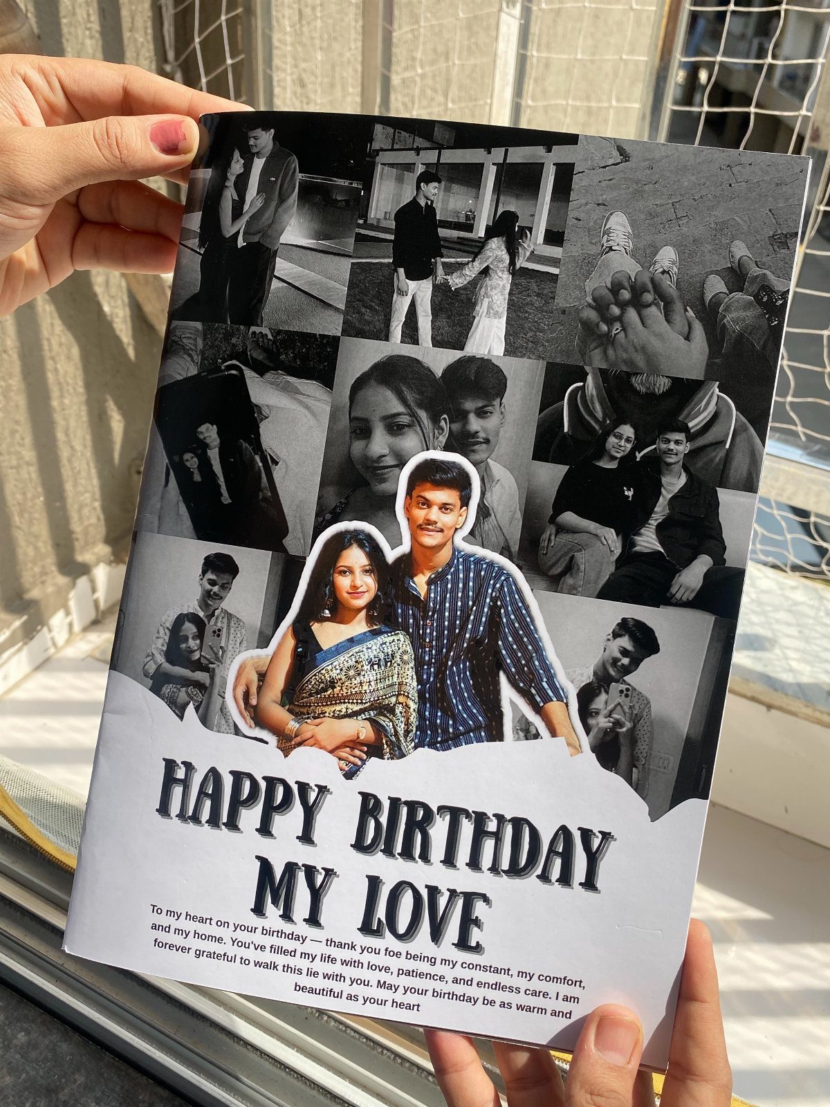 Personalized birthday book with a photo collage of a couple and romantic text.